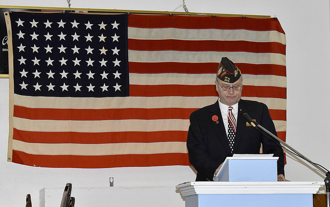 DAN HAMMOCK | THE DAILY WORLD 
Veterans were honored at the Aberdeen VFW post Wednesday. Former post commander Jim Daly read the history of Veterans Day as part of the ceremony.