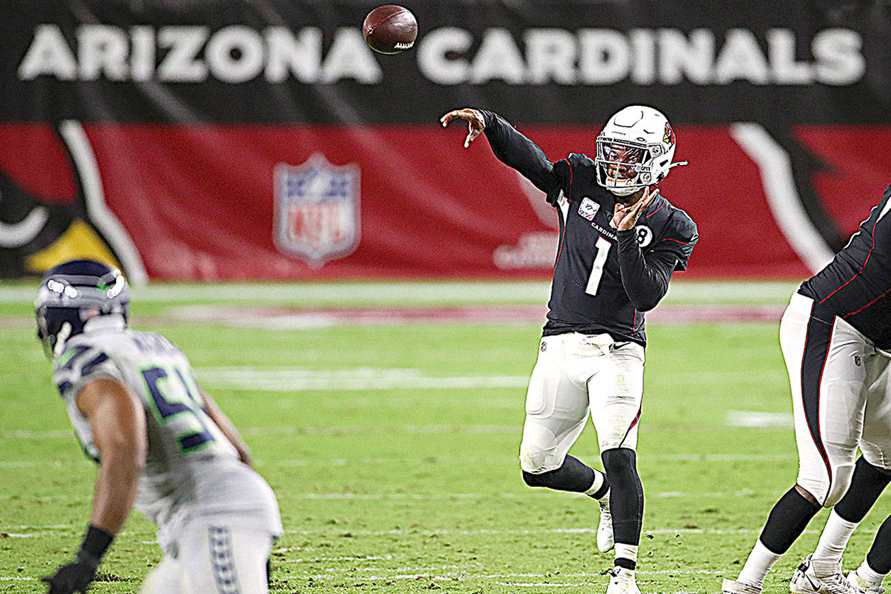 Quarterback Kyler Murray of the Arizona Cardinals passes the ball against the Seattle Seahawks in the third quarter on Sunday, Oct. 25, at State Farm Stadium in Glendale, Arizona. Murray threw for 360 yards and three touchdowns in that 37-34 overtime victory over Seattle. (Christian Petersen/Getty Images)