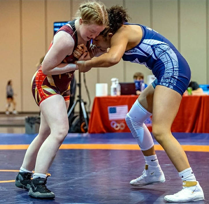 PHOTO BY JIM THRALL Choker Wrestling Club’s Tatum Pine, left, competes in the Junior 57KG class in the women’s freestyle event at the United World Wrestling National Championships in Omaha, Nebraska on Nov. 13-15. Pine placed sixth overall.