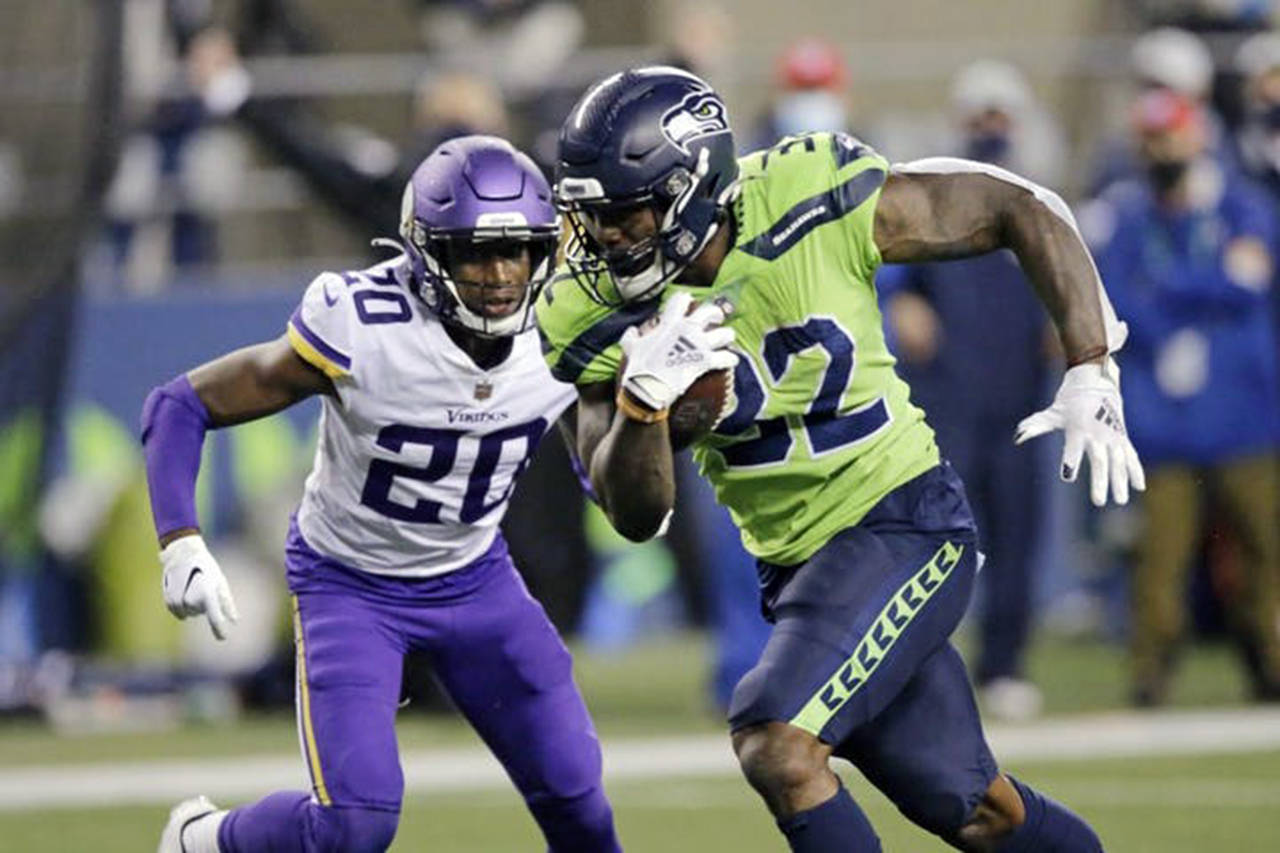 Seattle Times photo
The Seattle Seahawks’ Chris Carson rushes for a touchdown during the Oct. 11 game against the Minnesota Vikings.
