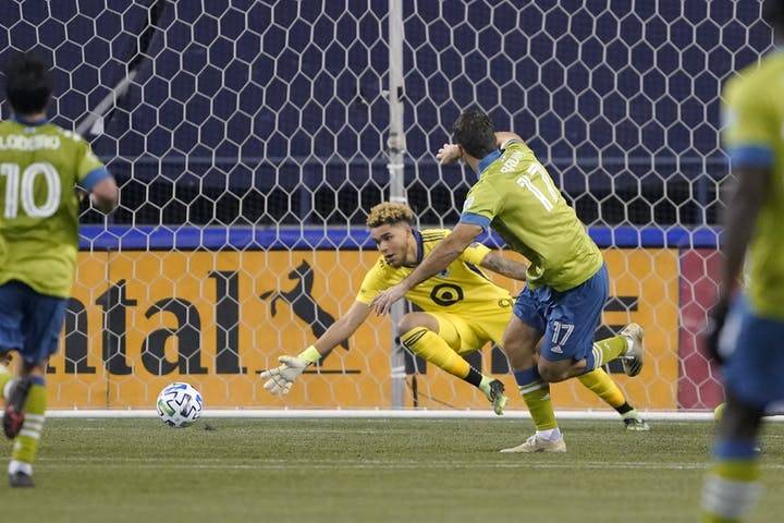 Minneapolis Star Tribune photo
Sounders forward Will Bruin watches his shot go past Minnesota United goalkeeper Dayne St. Clair as he scores during the second half of the Western Conference final Monday night in Seattle.