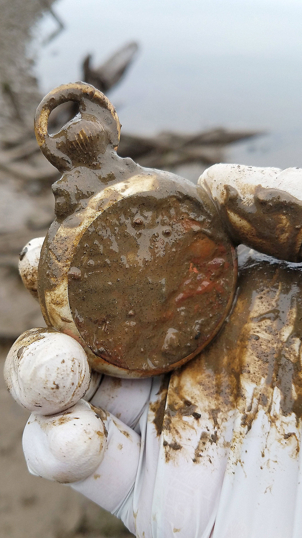 Photo by Marcy Merrill
North Cove photographer and artist Marcy Merrill leads “mudlarking” outings at the mouth of the Chehalis River, where she has discovered a plethora of artifacts.
