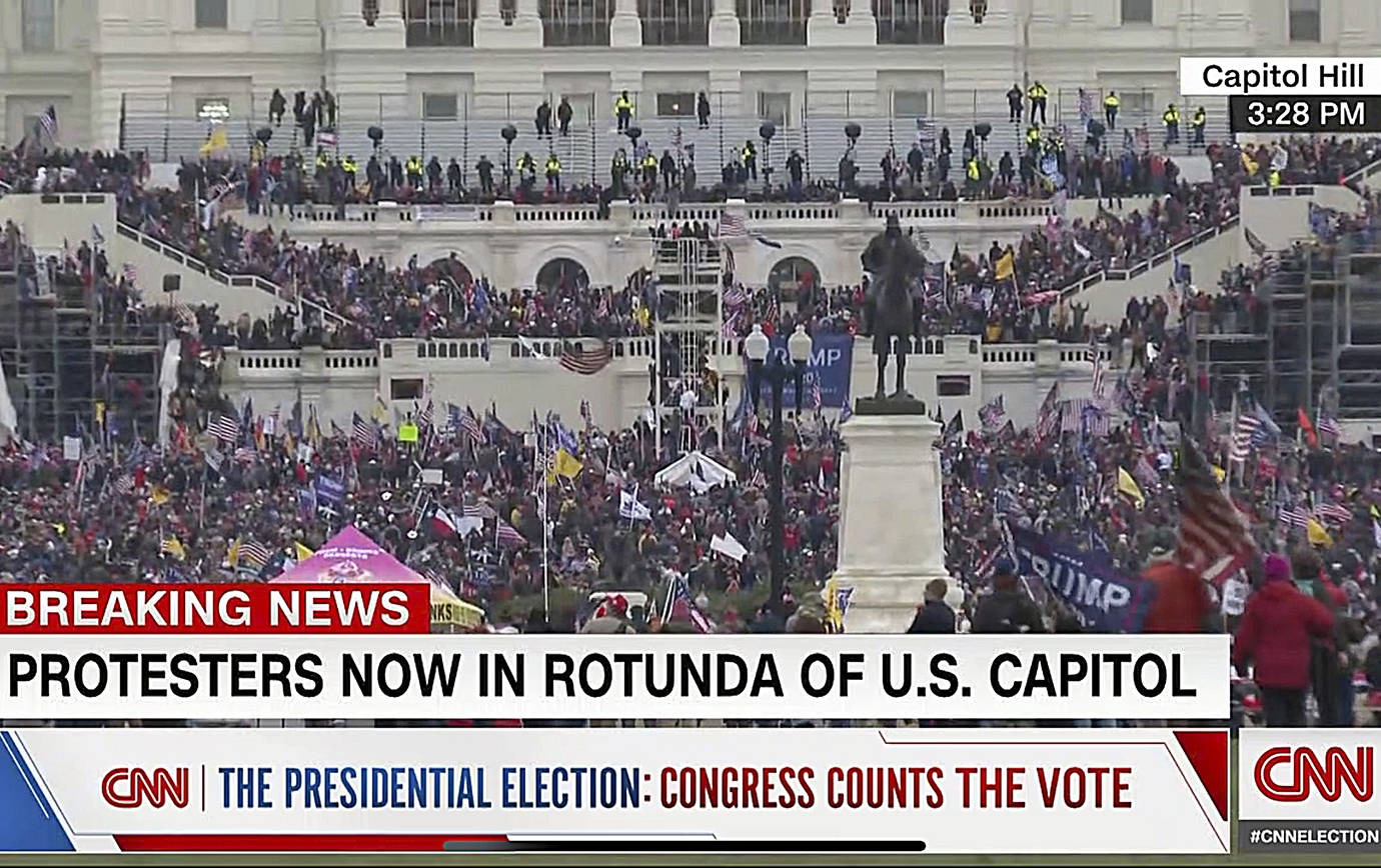 (Photo taken from television) Supporters of Donald Trump stormed the Capitol Wednesday.