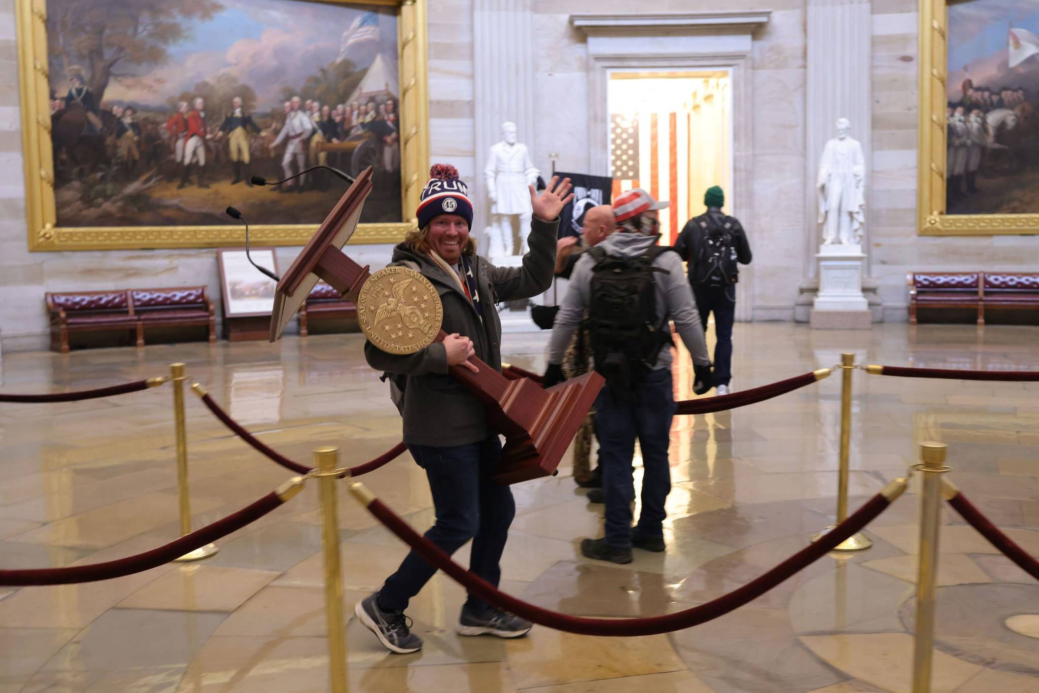 Win McNamee/Getty Images 
Adam Johnson, 36, of Parrish, Fla., faces felony charges after he was seen carrying House Speaker House Nancy Pelosi’s lectern through the U.S. Capitol on Jan. 6.