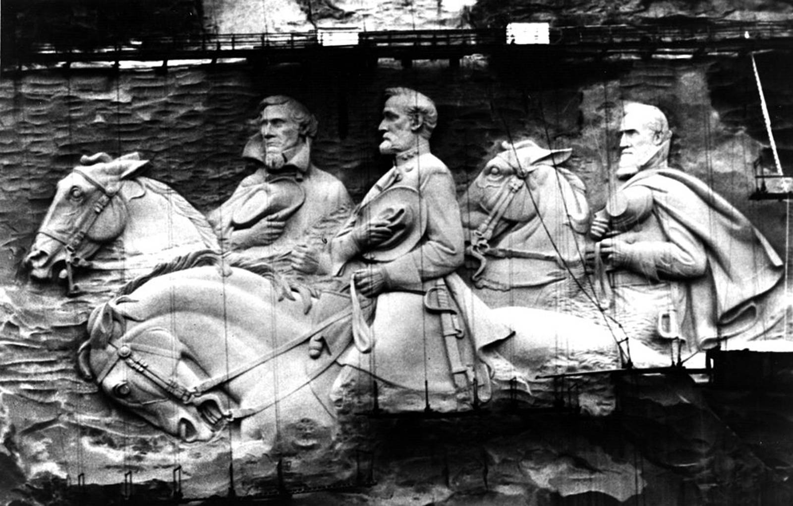 Photo by Fox Photos/Getty Images
Giant confederate figures sculptured in granite rock on Stone Mountain, Atlanta, pictured in 1969.