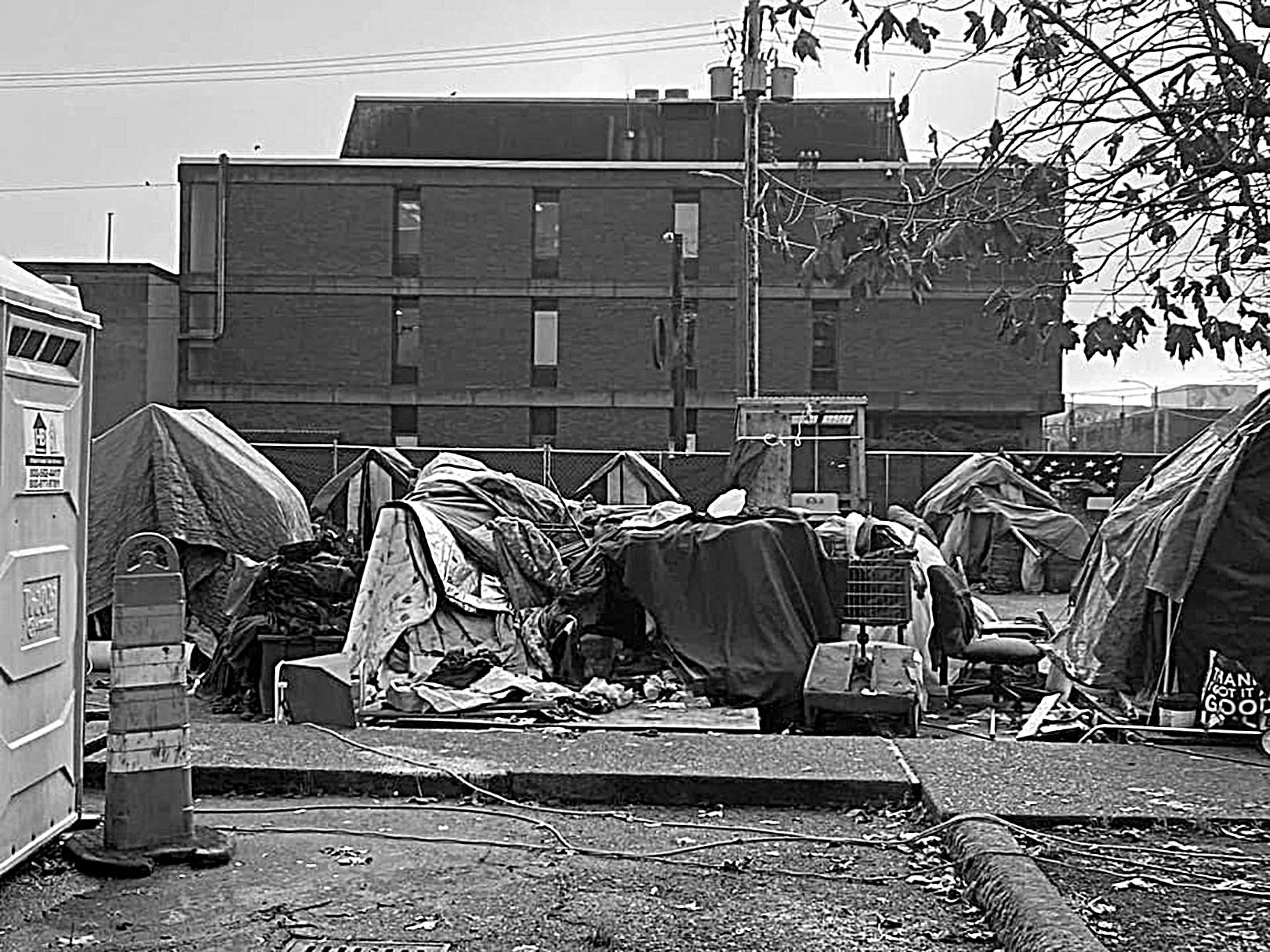 A look inside the fencing around the homeless camp adjacent to Aberdeen City Hall, visible in the background. (Photo Courtesy Kellie Daniels)