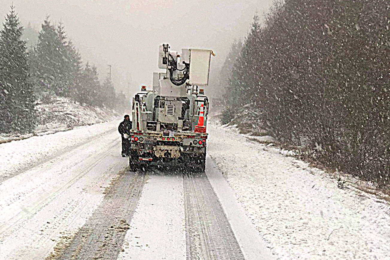Grays Harbor PUD crews dealt with daunting conditions Saturday as they responded to more than 100 reports of downed lines and power outages over the weekend. (Courtesy GHPUD)