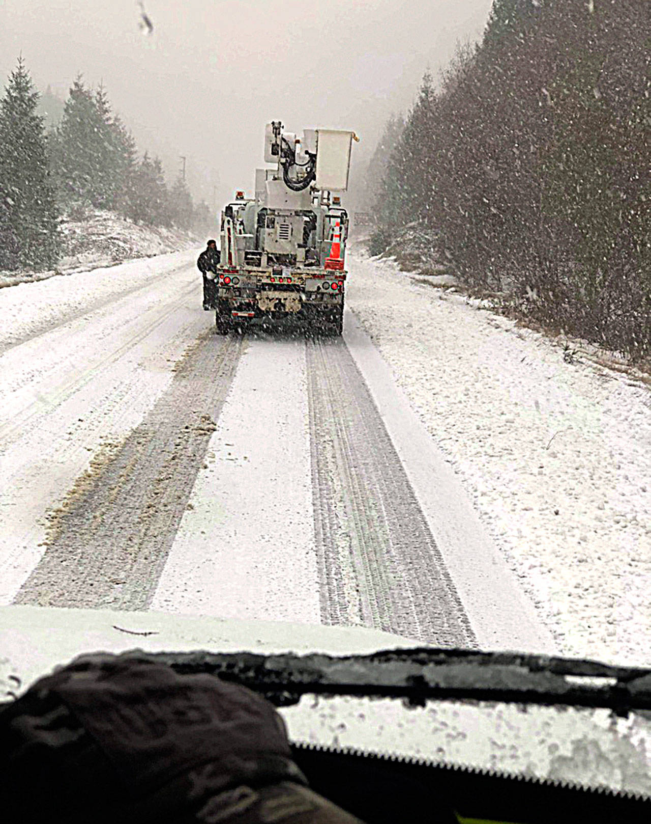 Grays Harbor PUD crews dealt with daunting conditions Saturday as they responded to more than 100 reports of downed lines and power outages over the weekend. (Courtesy GHPUD)