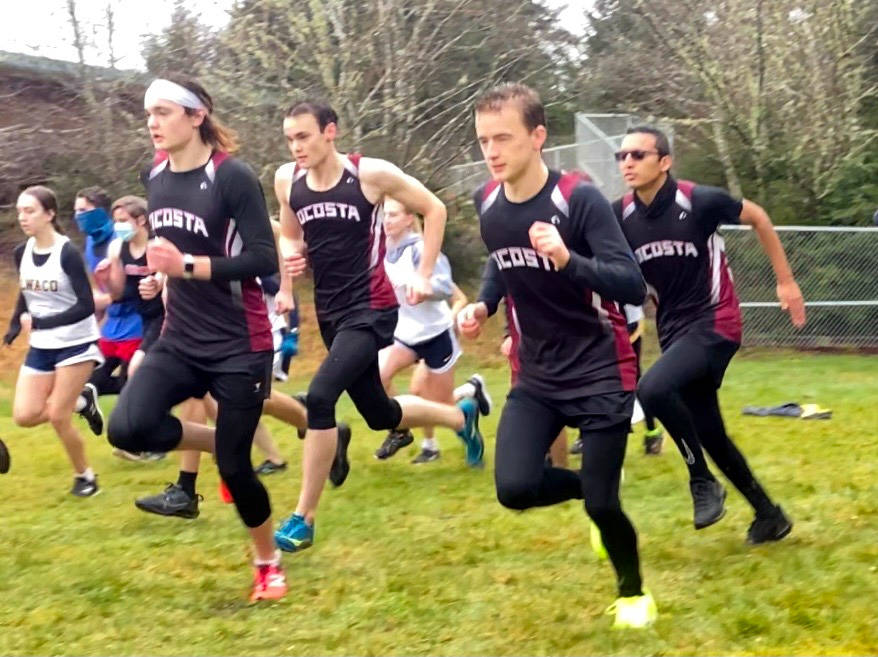 Ocosta cross country runners, from left, Matthew Idso, William Idso, Dylan Todd and Orlando Guevara compete at the Ilwaco XC Meet on Thursday in Ilwaco. (Submitted photo)