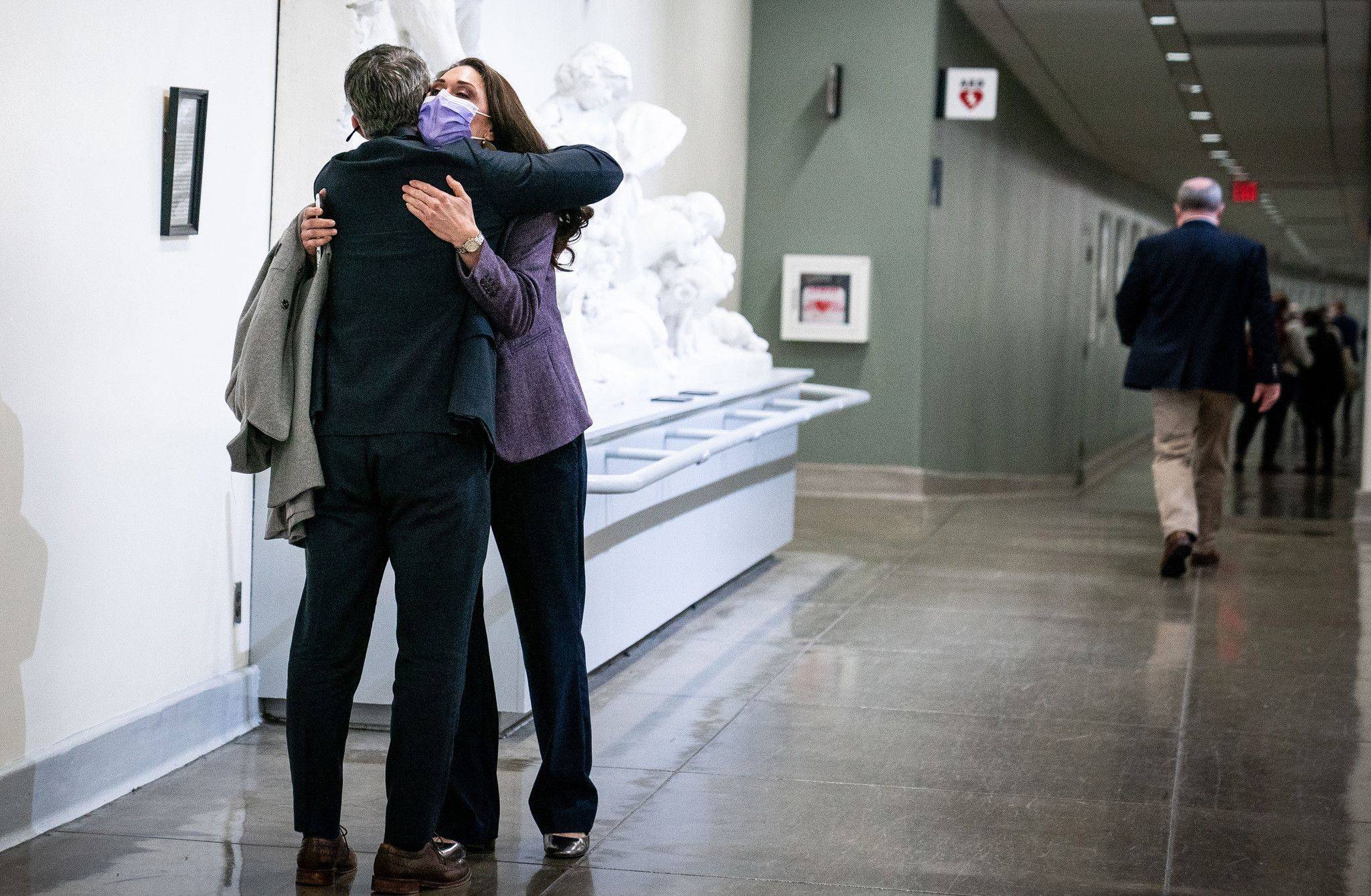 Armando L. Sanchez/Chicago Tribune
Reps. Adam Kinzinger, R-Ill., and Jaime Herrera Beutler, R-Wash., who both voted to impeach President Donald Trump, exchange a hug during the vote at the Capitol in Washington, D.C., on Jan. 13.