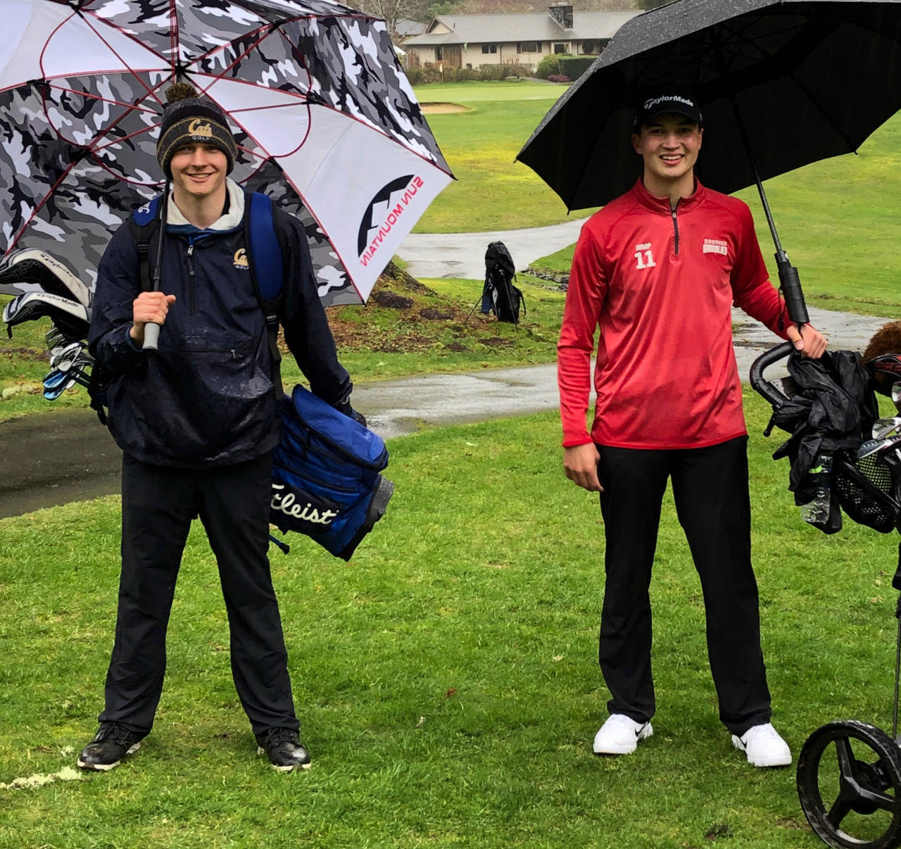Aberdeen’s Nolan King, left, and Hoquiam’s Michael Jump pose for a photo after their respective teams met for a match on Thursday at Grays Harbor Country Club. Both will be competing for Grays Harbor Community College next season. (Submitted photo)