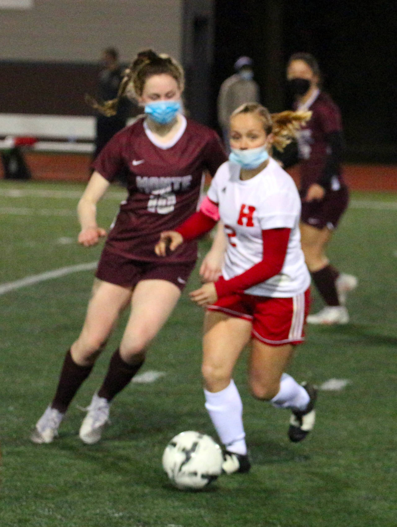 Hoquiam forward Sadie Carlyle, right, looks to pass while being defended by Montesano midfielder Brooke Streeter during Tuesday's game at Jack Rottle Field in Montesano. (Ryan Sparks | The Daily World)