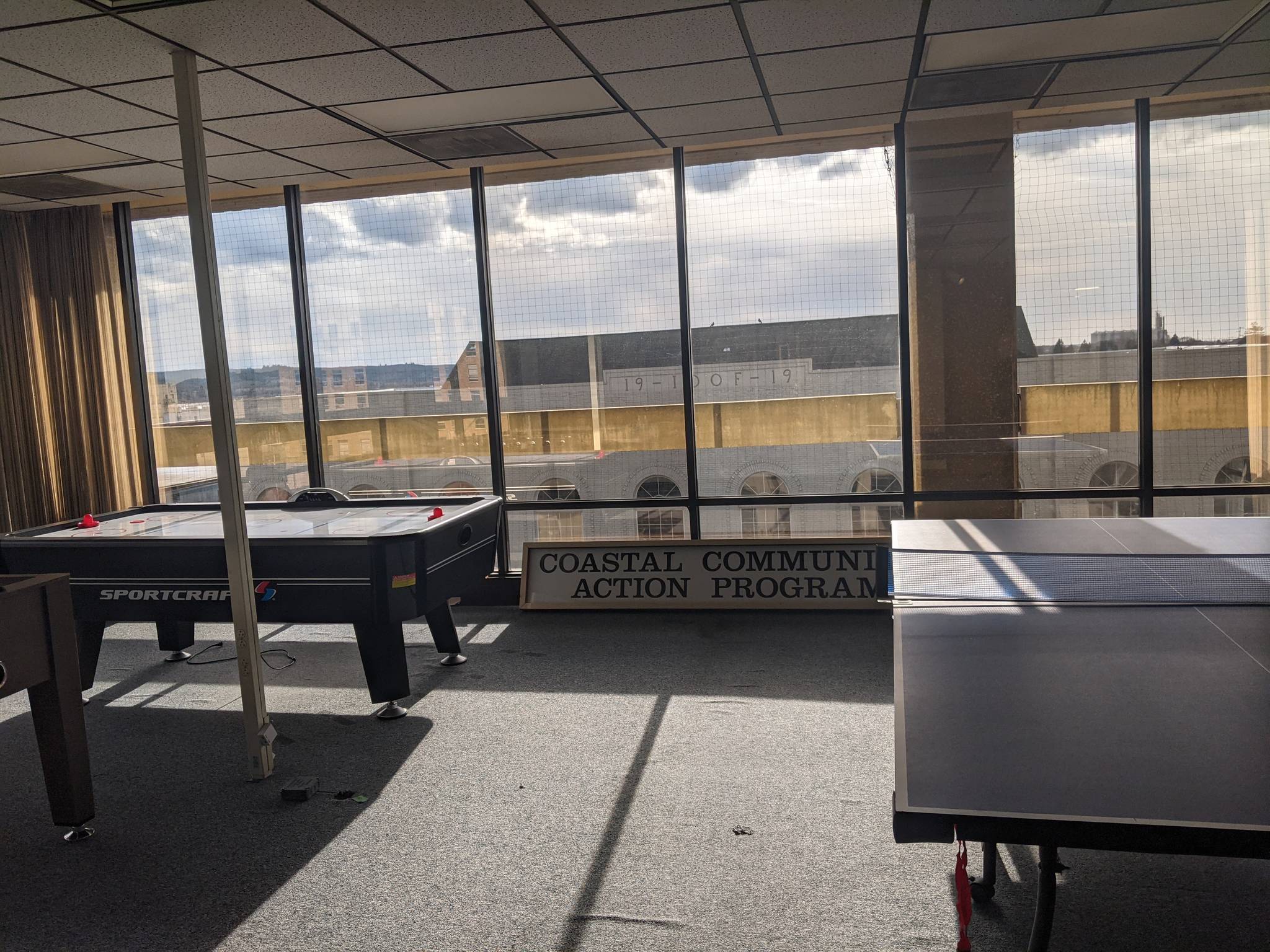 A break room for CCAP employees features table tennis and air hockey with a spectacular view of downtown Aberdeen.