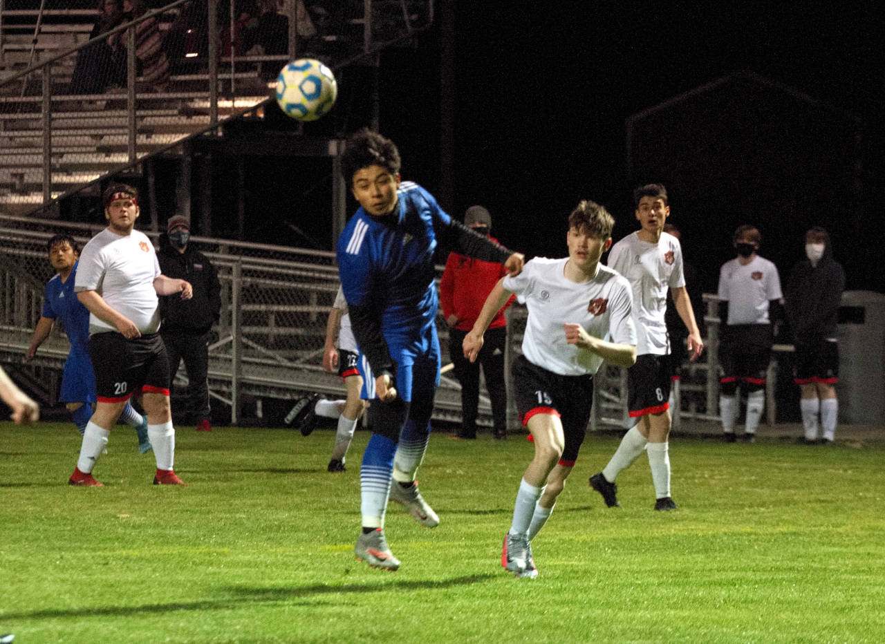 Elma’s Manny Hernandez sends a header toward goal during the Eagles’ 7-0 season-opening victory over Tenino on Wednesday at Davis Field in Elma. (Ryan Sparks | The Daily World)