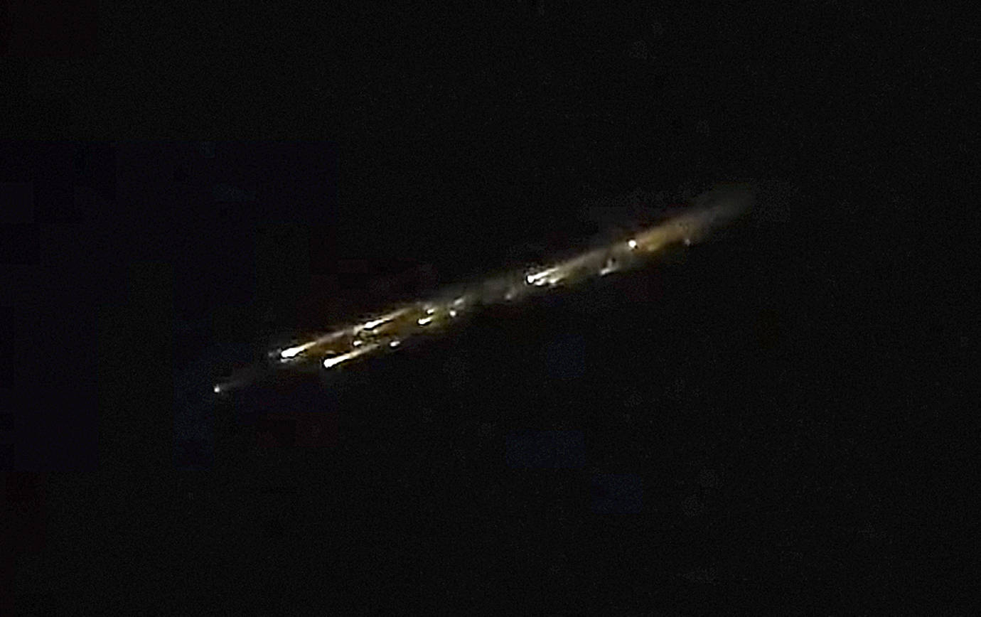 COURTESY BEN WINKELMAN
A rocket burns up in the atmosphere above Hoquiam Thursday night.