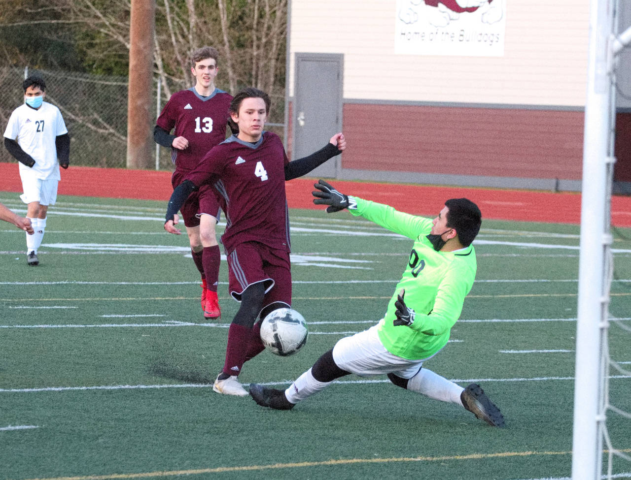 Montesano’s Veli Ambrocio (4) puts a shot past Raymond-South Bend goal keeper Oscar Juarez for his second goal of the game and a three-goal lead in Monte’s 3-1 win on Monday at Jack Rottle Field in Montesano. (Ryan Sparks | The Daily World)