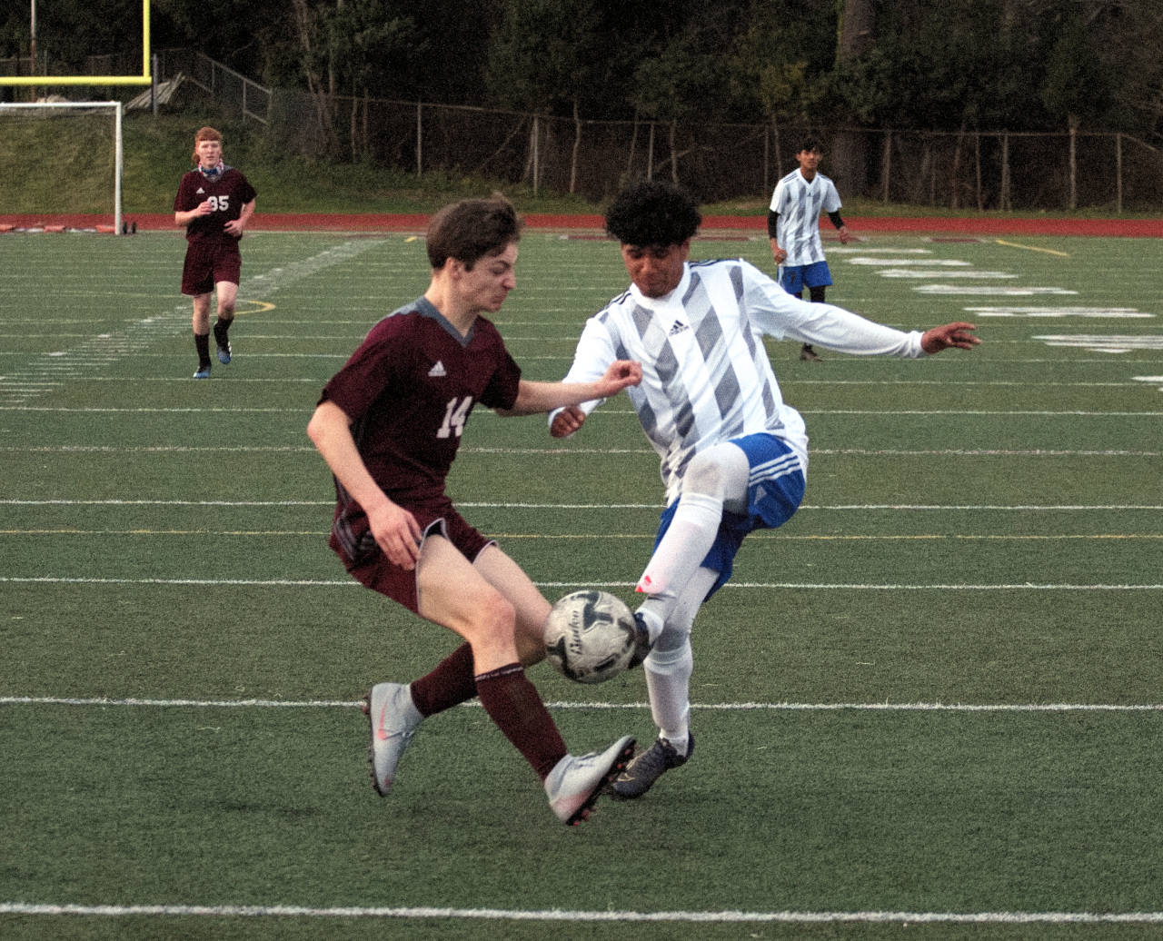RYAN SPARKS | THE DAILY WORLD Montesano’s Cole Ekerson (14) and Elma’s Rodrigo Luna battle for possession during Elma’s 3-0 victory on Wednesday at Jack Rottle Field in Montesano.