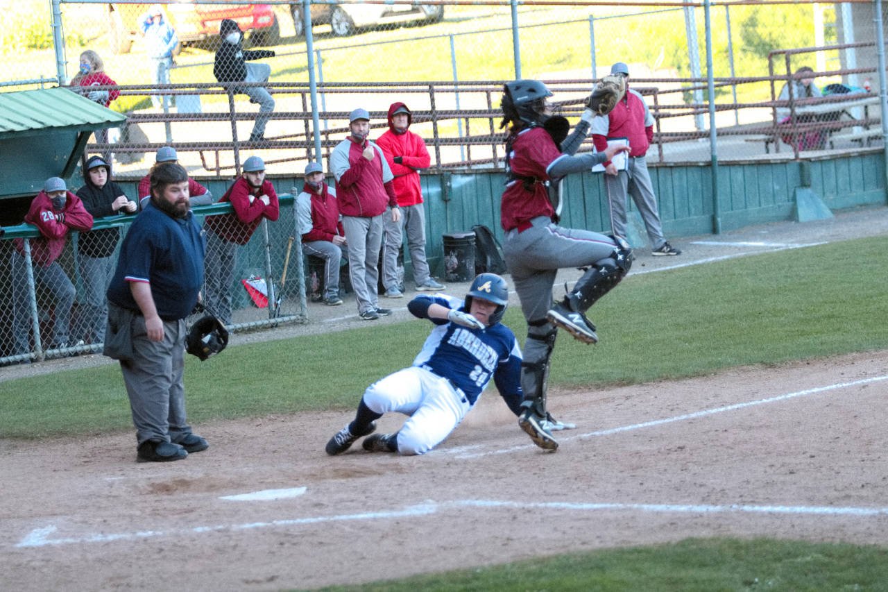 photos by RYAN SPARKS / THE DAILY WORLD
Aberdeen’s Hunter Eisele (20) scores during the Bobcats 13-3 win over Hoquiam on Monday at Olympic Stadium in Hoquiam.