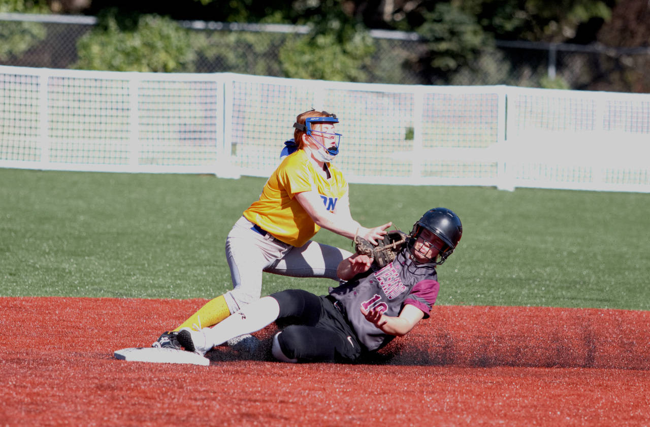 RYAN SPARKS | THE DAILY WORLD Montesano’s Jessica Stanfield collides with Adna second baseman Natalie Loose during the Bulldogs 8-4 loss to the Pirates on Thursday at Montesano High School.