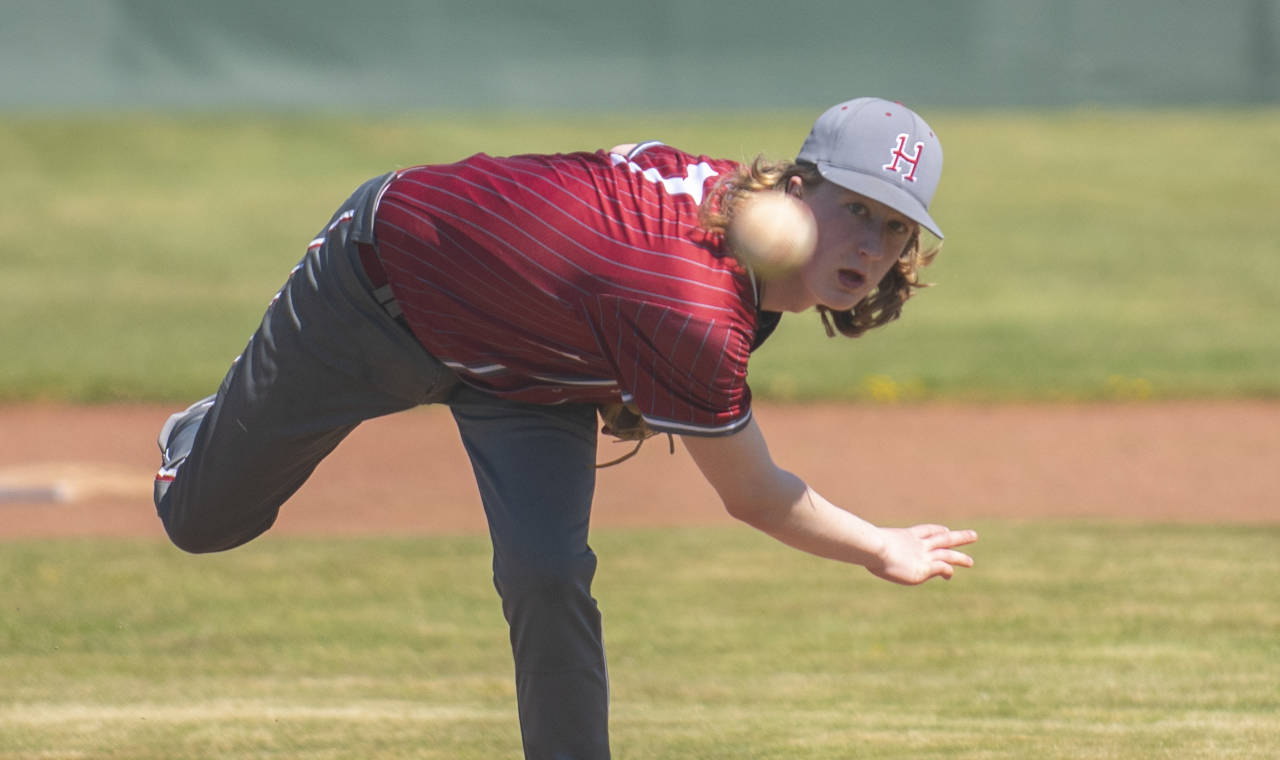 ERIC TRENT | THE CHRONICLE Hoquiam’s Mick Bozich throws a pitch against the Tenino Beavers on Saturday in Tenino. The Grizzlies swept a pair of games over the weekend for their first wins of the season.