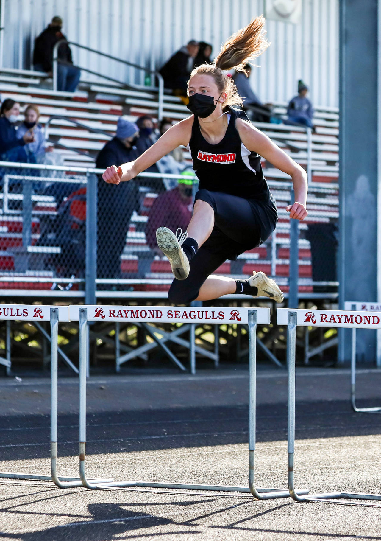 PHOTO BY LARRY BALE Raymond’s Kyra Gardner, seen here in a file photo, won the 100-meter hurdles, the long jump, high jump and triple jump at the 2B District 4 Championships on Thursday at Rainier High School.