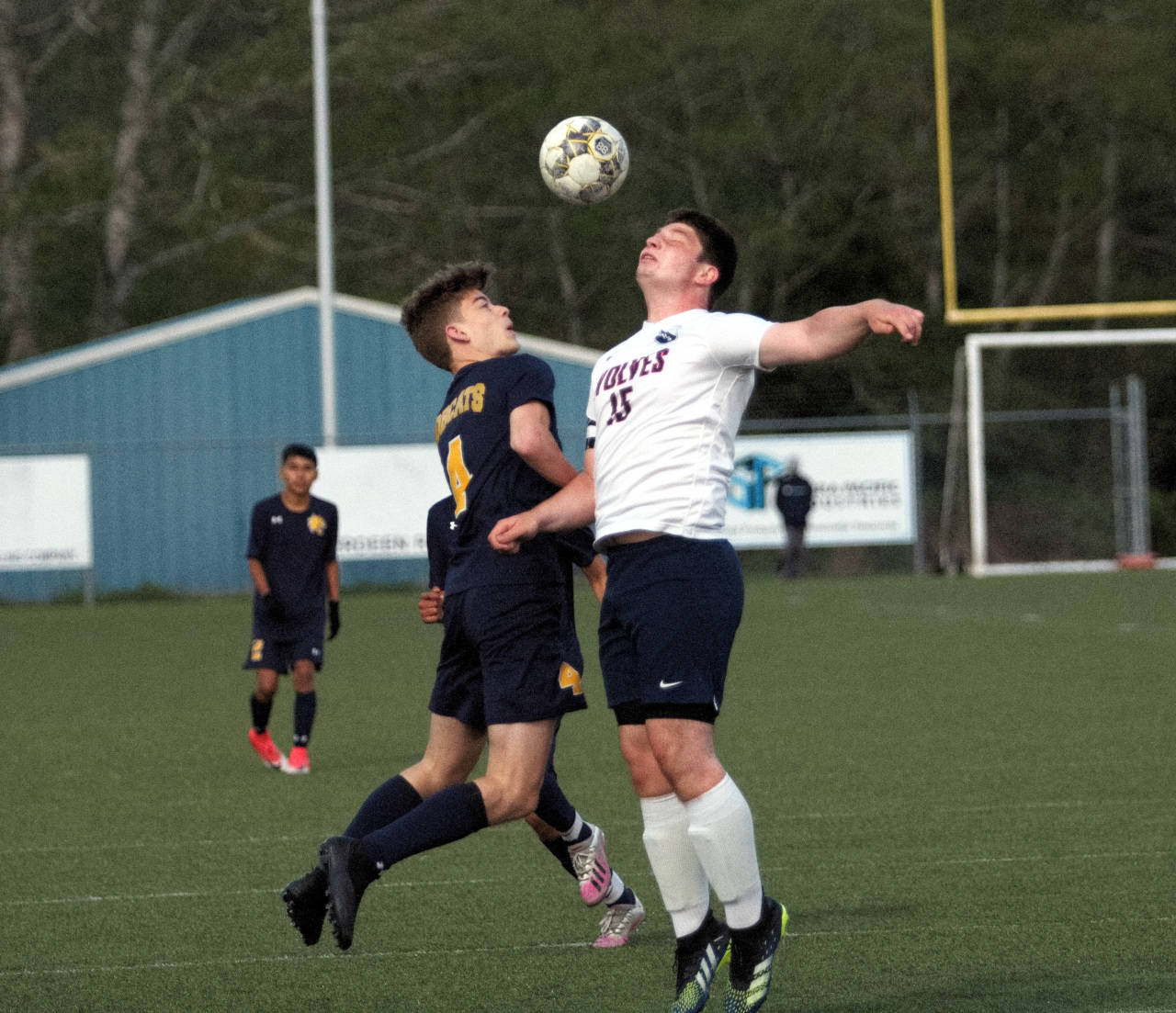 RYAN SPARKS | THE DAILY WORLD Aberdeen’s Kaleb Myers, left, and Black Hills’ Calvin Griffiths compete for a header during Aberdeen’s 4-0 win in the first round of the 2A District 4 Tournament on Saturday at Stewart Field in Aberdeen.