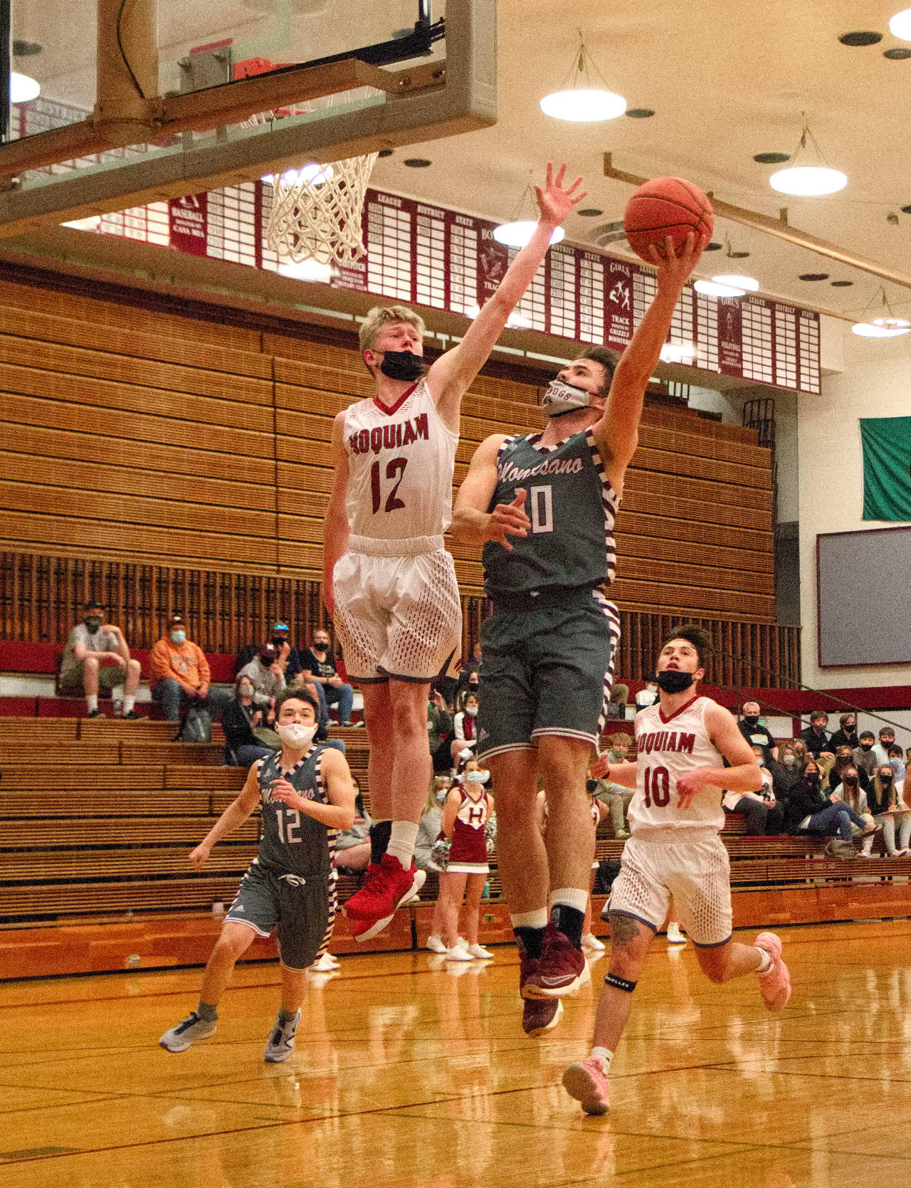RYAN SPARKS | THE DAILY WORLD Montesano’s Trace Ridgway (10) drives to the hoop against Hoquiam’s Michael Lorton-Watkins (12) during the first half of Montesano’s 55-45 victory on Tuesday at Hoquiam Square Garden. Ridgway led all scorers with 24 points in the game.