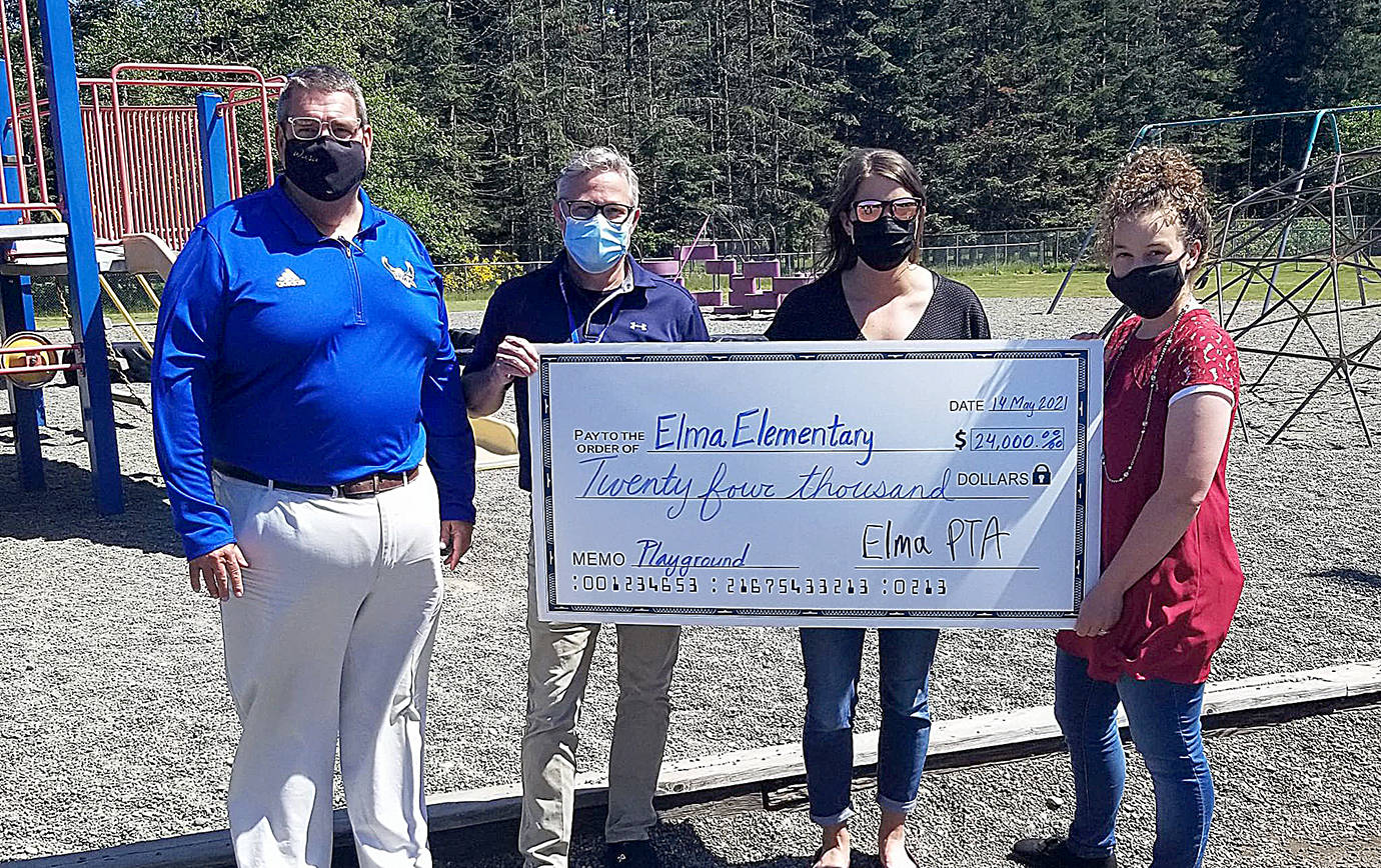 Courtesy photo 
The Elma PTA presented a $24,000 check May 14 for new playground equipment at Elma Elementary. The money was raised by Elma kids. Pictured from left are Elma Schools Superintendent Kevin Acuff, Elma Elementary Principal Mark Keating, Elma PTA Treasurer Darcy Dotson, and PTA President Kina Delimont.