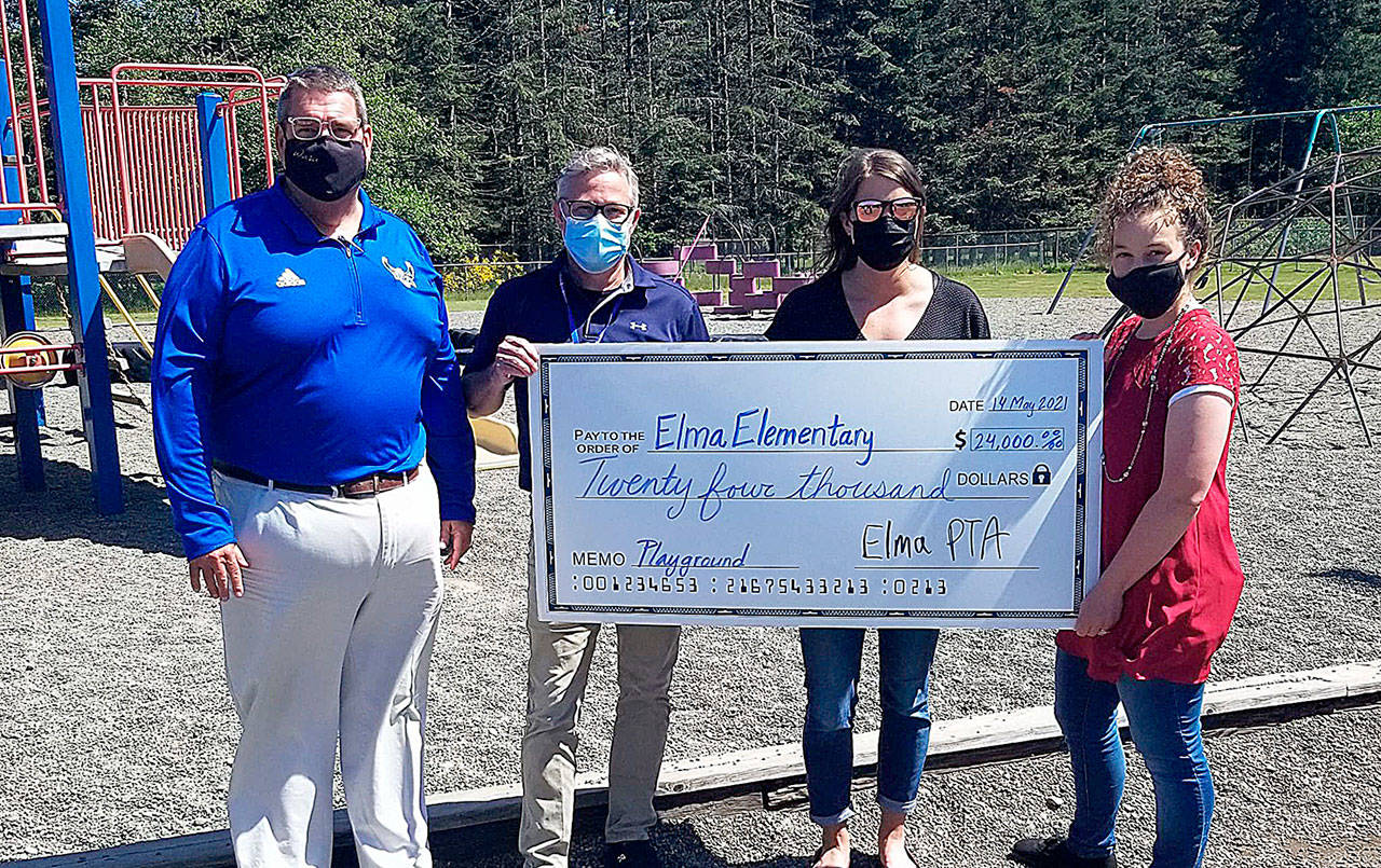 Courtesy photo 
The Elma PTA presented a $24,000 check May 14 for new playground equipment at Elma Elementary. The money was raised by Elma kids. Pictured from left are Elma Schools Superintendent Kevin Acuff, Elma Elementary Principal Mark Keating, Elma PTA Treasurer Darcy Dotson, and PTA President Kina Delimont.