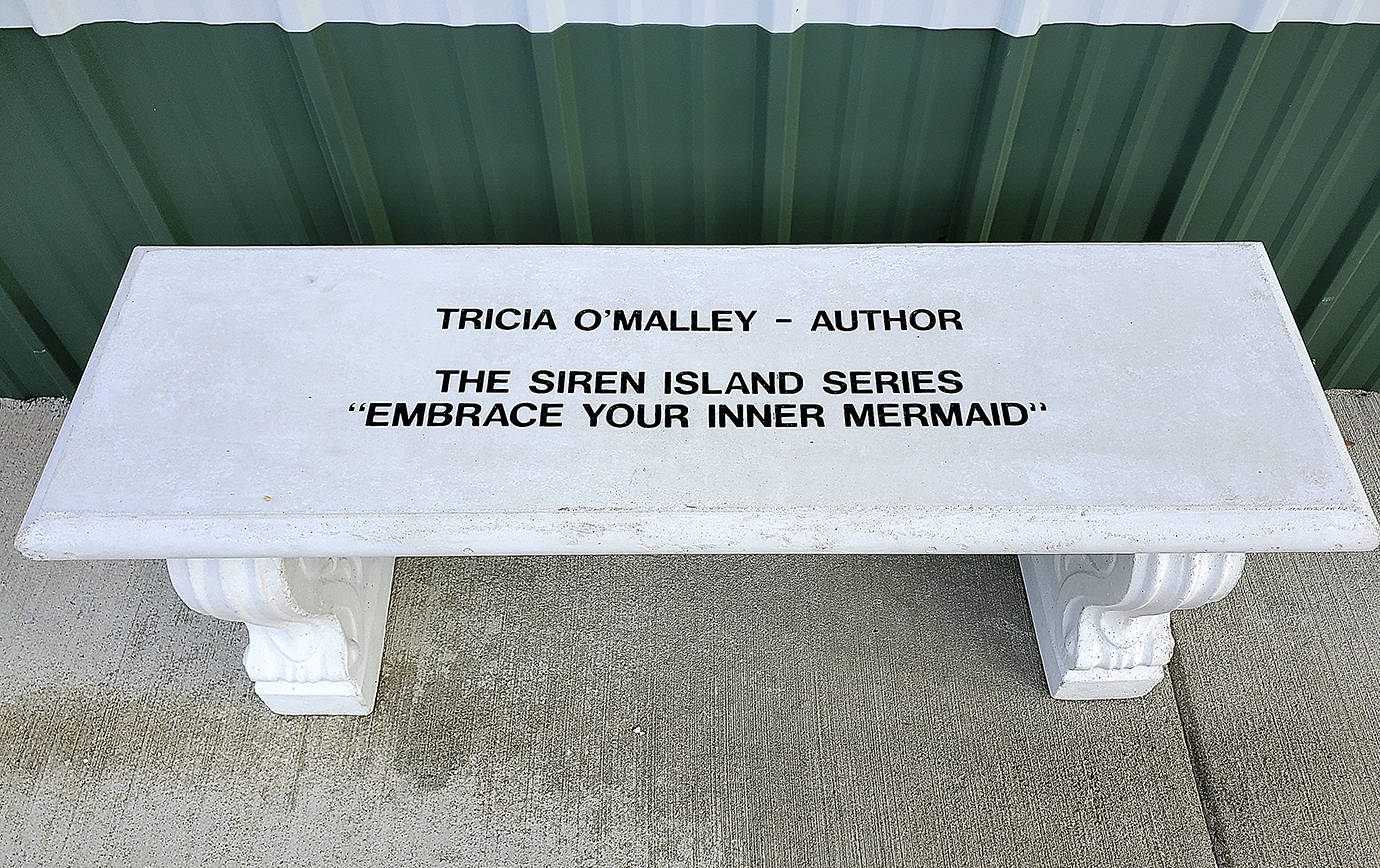 Courtesy International Mermaid Museum 
Author Tricia O’Malley donated this bench to the International Mermaid Museum. O’Malley is a long-time supporter of the Westport Winery, where the museum is located.