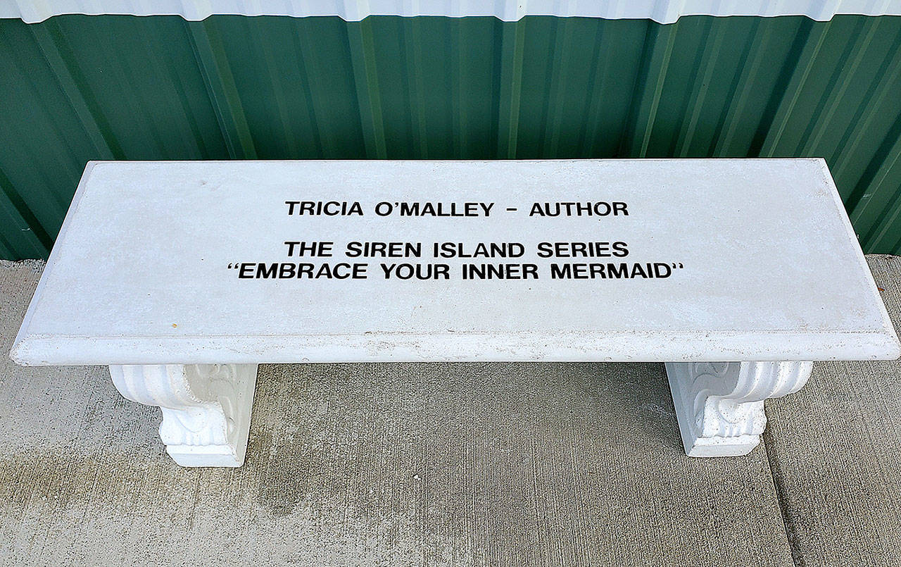Courtesy International Mermaid Museum 
Author Tricia O’Malley donated this bench to the International Mermaid Museum. O’Malley is a long-time supporter of the Westport Winery, where the museum is located.