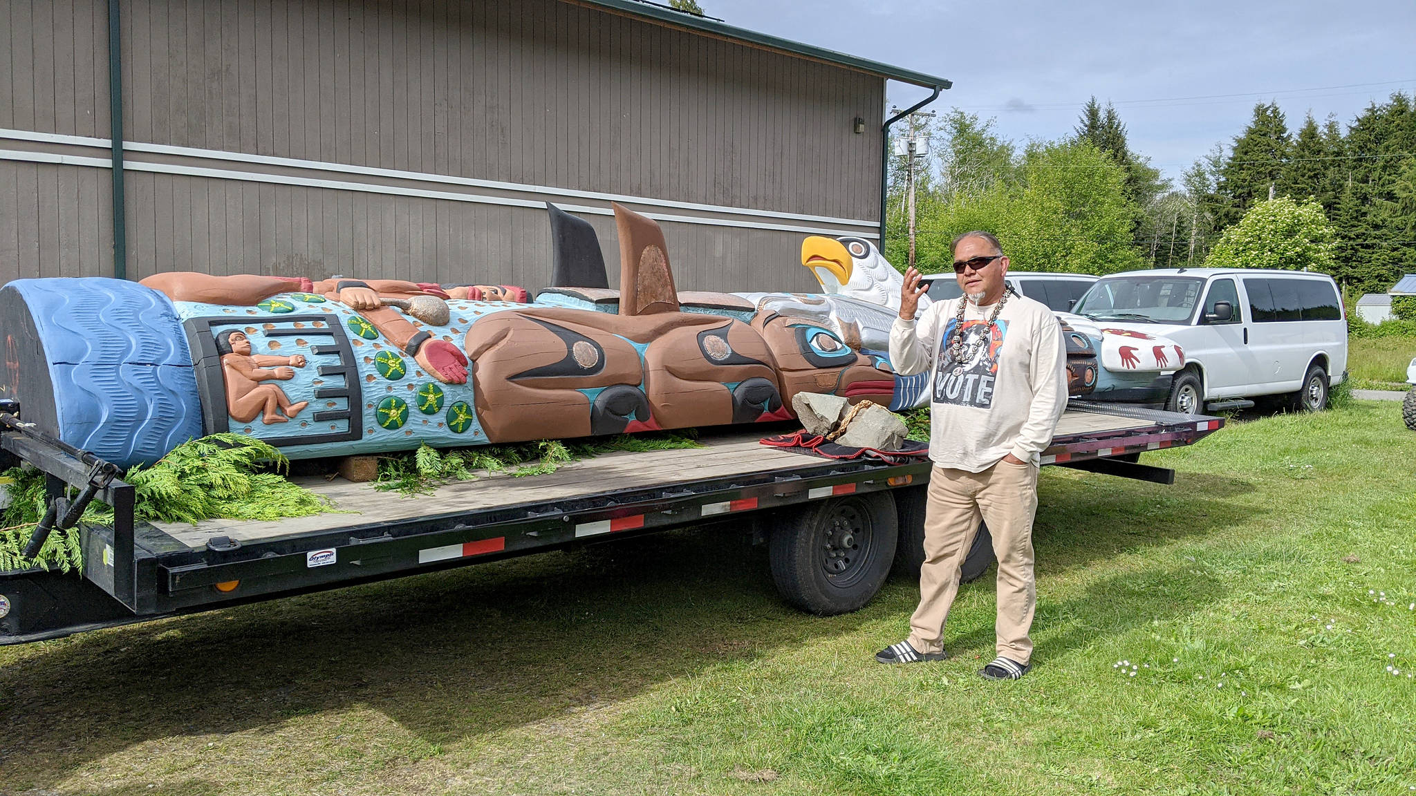 Photo provided by Ruben Estavillo
Lummi Nation citizen and Northwest tour organizer Freddie Sul ka dub Lane, explains the different aspects of the totem pole during a stop in Queets on Wednesday afternoon.