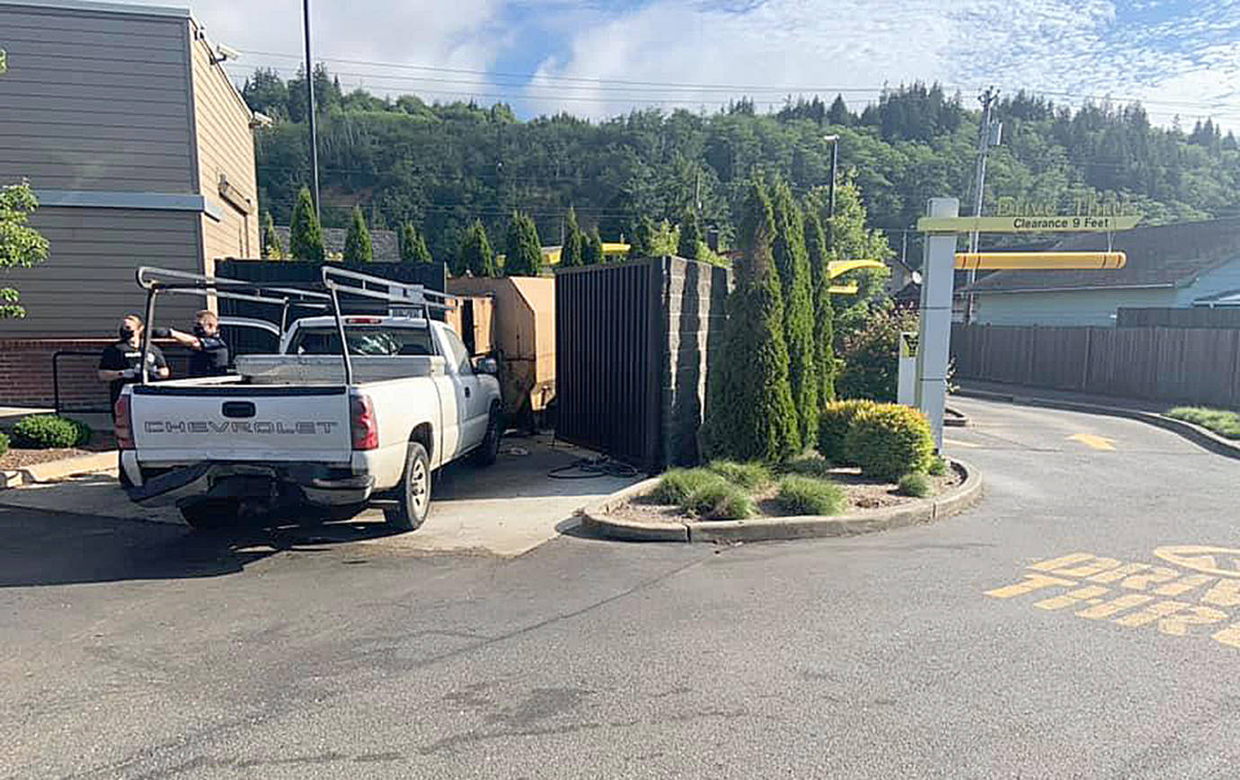 Courtesy Hoquiam Police Department
This truck was attempting to pull into the Hoquiam McDonald’s drive through Friday morning when it was rear-ended, sending it into the dumpsters. The driver was transported to Harbor Regional Health Community Hospital in Aberdeen with undisclosed injuries.