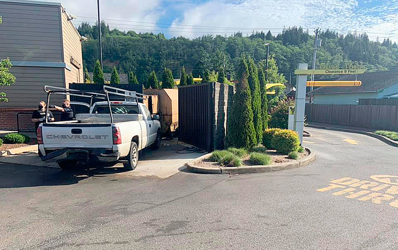 Courtesy Hoquiam Police Department
This truck was attempting to pull into the Hoquiam McDonald’s drive through Friday morning when it was rear-ended, sending it into the dumpsters. The driver was transported to Harbor Regional Health Community Hospital in Aberdeen with undisclosed injuries.
This truck was attempting to pull into the Hoquiam McDonald’s drive-through Friday morning when it was rear ended, sending it into the dumpsters. The driver was transported to Harbor Regional Health Community Hospital in Aberdeen with undisclosed injuries. (Courtesy Hoquiam Police Department)