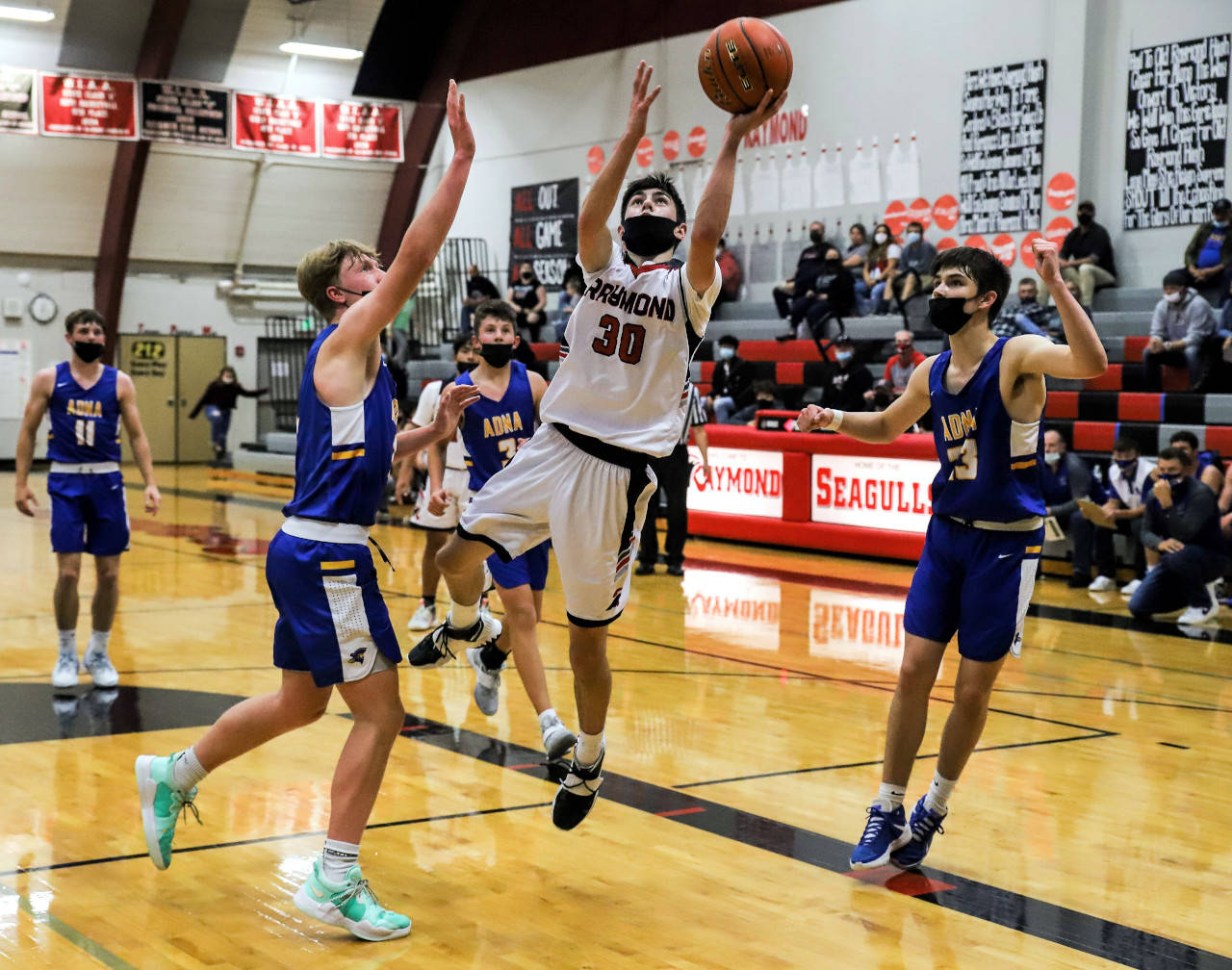 PHOTO BY LARRY BALE
Raymond's Morgan Anderson (30) was named to the First Team of the 2B Pacific All-League Boys Basketball Team on Friday after averaging over 19 points per game this season.
