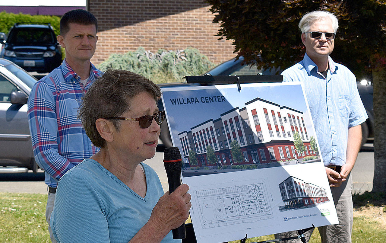 DAN HAMMOCK | THE DAILY WORLD 
Willapa Community Development Association co-founder Rebecca Chaffee, who has been with the project for decades, speaks at the ground-breaking ceremony for the new Willapa Center in Raymond on Thursday. Behind her, flanking a rendering of the affordable housing/early learning/office facility are 19th District Rep. Joel McEntire, left, and Timothy Quinn of Tonkin Architecture, which designed the structure.