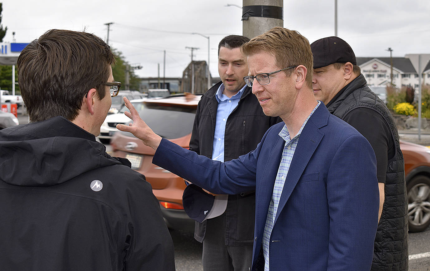 DAN HAMMOCK | THE DAILY WORLD 
Congressman Derek Kilmer was in Aberdeen Wednesday to talk about the importance of the East Aberdeen rail separation project. Here he speaks with Aberdeen City Engineer Kris Koski at the intersection of Highway 12 and South Newell Street.