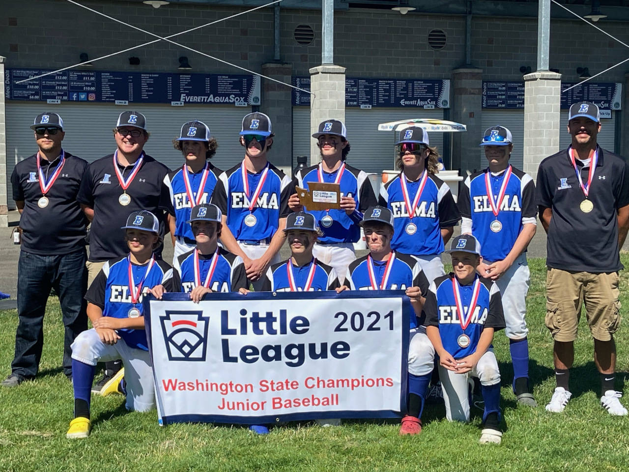 PHOTO BY AMY SPOON The Elma Little League 14-and-under Juniors Division team won a state championship with a 12-5 victory over North Central (Seattle) Little League on Thursday at Funko Field in Everett. Pictured are (back row, from left): Coach Travis Moe, Coach Chazen Hurd, Brody Palmer, Cameron Green, Ethan Camus, Jackson Alexander, Isaac McGafey, Head Coach William McGaffey. Front row (from left): Tanner Moe, Ashton McKinney, TJ Dunlap, Rusty Johnson and Braiden Stewart.