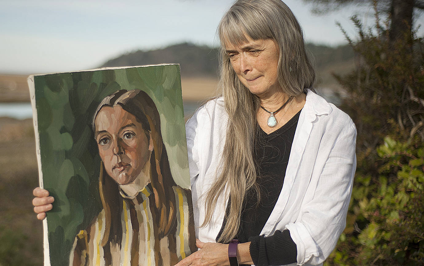photos by Judith Altruda 
Shoalwater Bay Tribe member Mary Downs with a portrait Eugene Landry painted of her in 1969. It will be part of the display of Landry’s works at the tribe’s museum starting Sept. 17, 2021.