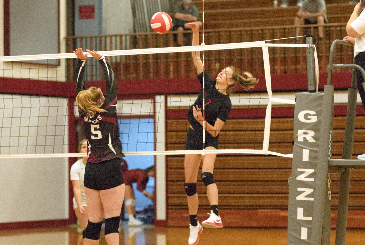 RYAN SPARKS | THE DAILY WORLD Raymond’s Kyra Gardner slams home a kill against the Ocosta Wildcats during the Hoquiam Volleyball Jamboree on Thursday in Hoquiam. The prep volleyball season is scheduled to begin on Tuesday, with multiple Twin Harbors teams in action.