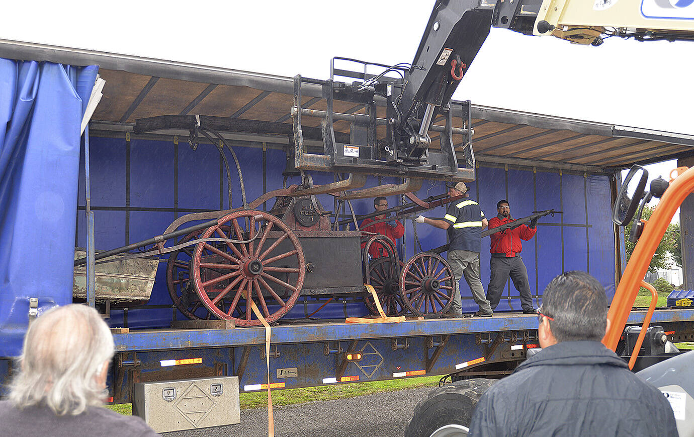 daily world File photo 
The Aberdeen Museum of History’s Old Tiger 1855 fire pumper was one of the many artifacts salvaged from the armory fire of June 2018. It, along with some other larger pieces, was moved into the current collection storage facility off Port Industrial Road in September 2018, where the recovered collection remains.