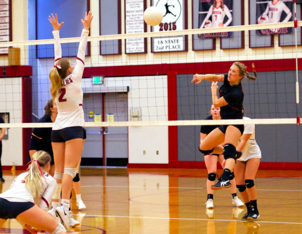 PHOTO BY PATTI REYNVAAN
Raymond’s Karsyn Freeman, right, attempts a kill while Hoquiam’s Kristina Goulet (2) defends during the Seagulls straight-set victory on Thursday at Hoquiam Square Garden.