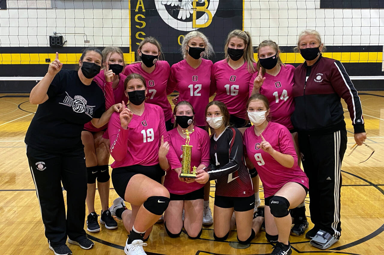 SUBMITTED PHOTO The Ocosta Wildcats volleyball team pose for a photo after winning the North Beach Invitational on Saturday in Ocean Shores.
