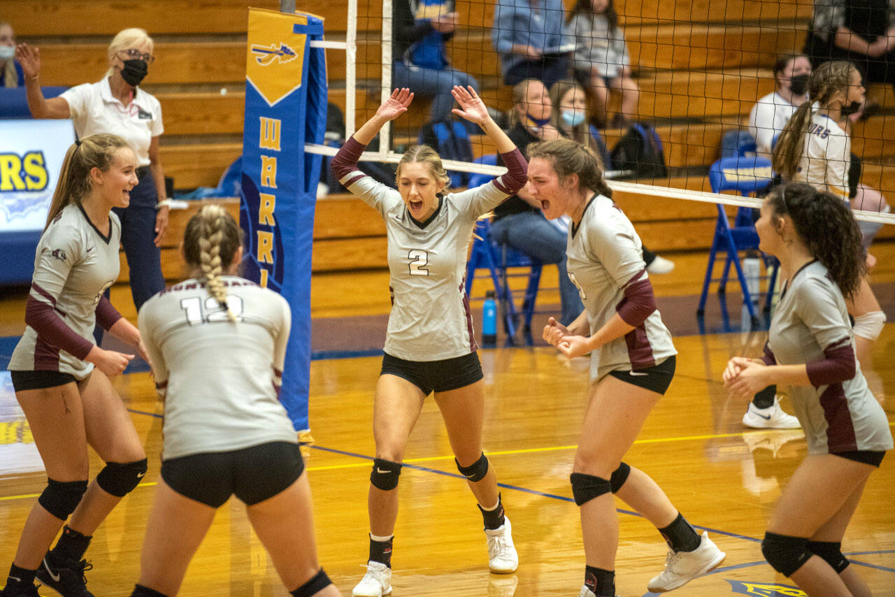 ERIC TRENT | THE CHRONICLE Montesano celebrates scoring a point against Rochester in the Bulldogs’ 3-1 victory on Monday at Rochester High School.