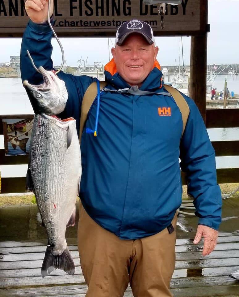 photo by Westport Weighmaster 
Rob Jorstad of Olympia with his winning coho. He’ll pick up his $1,500 prize on Saturday for the largest coho of the season in the Westport Charterboat Association derby.
