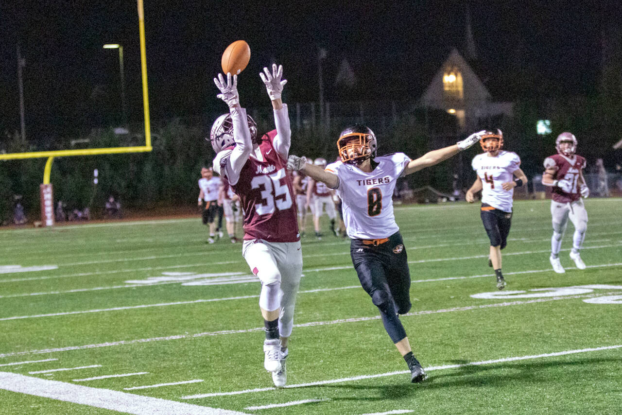 PHOTO BY SHAWN DONNELLY Montesano receiver Caydan Lovell (35) makes a catch against Napavine’s Ethan Lantz during Montesano’s 56-47 loss on Friday in Montesano.