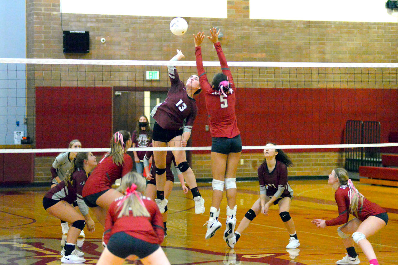 RYAN SPARKS | THE DAILY WORLD Montesano middle blocker Addie Winter (13) attempts a kill against Hoquiam’s Chloe Kennedy (5) during Tuesday’s 3-2 victory over Montesano at Montesano High School. Winter led the Bulldogs with 13 kills in the match.