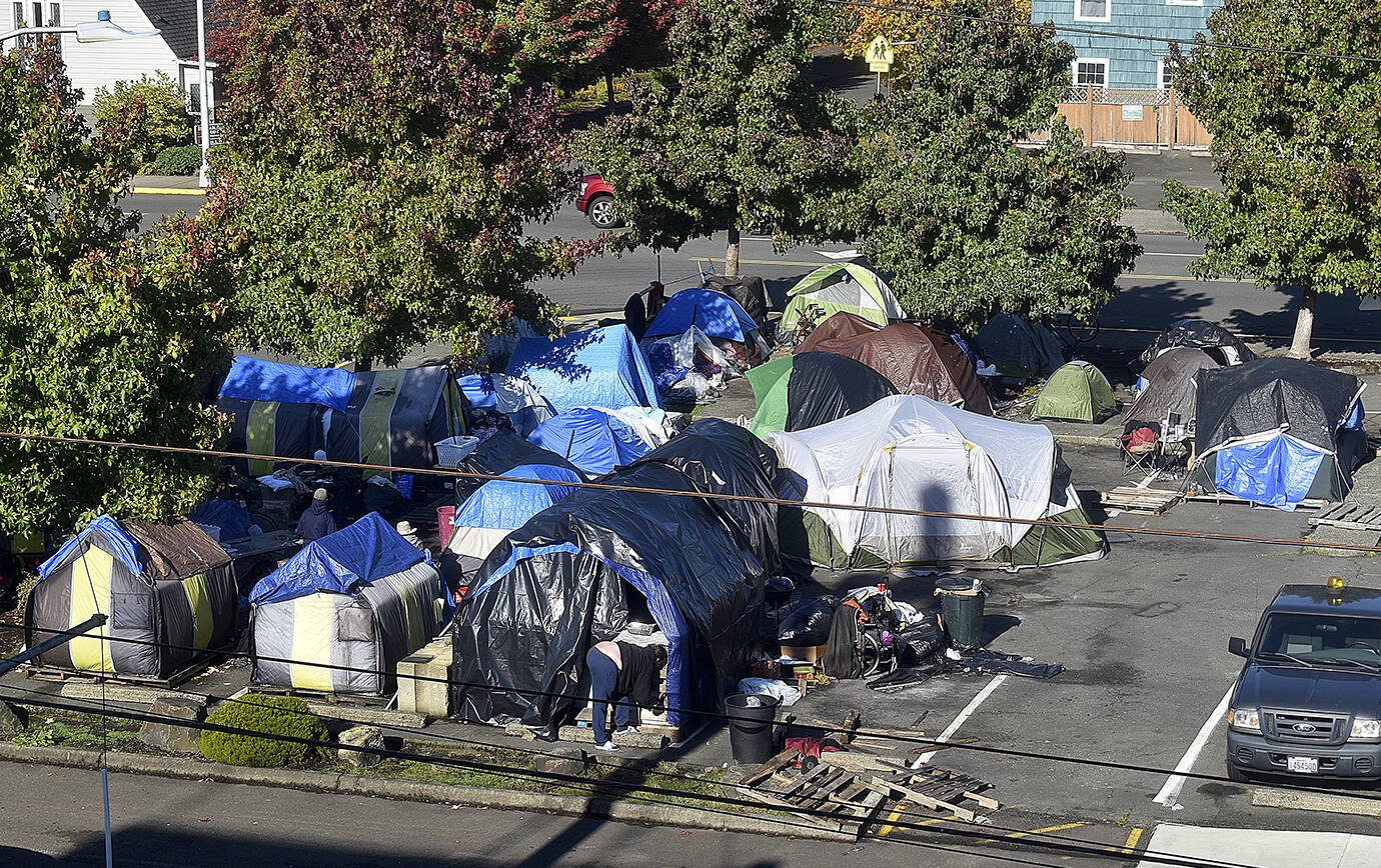 DAN HAMMOCK | THE DAILY WORLD 
The TASL tent camp adjacent to Aberdeen City Hall on Monday, Oct. 18, 2021. The camp has continued to grow despite its closure in mid-July.