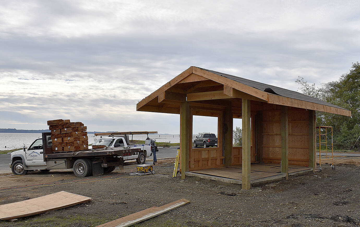 DAN HAMMOCK | THE DAILY WORLD
Hoquiam's newest waterfront park, newly-named Old Cannery Park, continues to take shape. Tuesday, Oct. 19, crews were getting ready to shingle the roof of the covered picnic area at the park, located near Fifth Street and Adams Street.