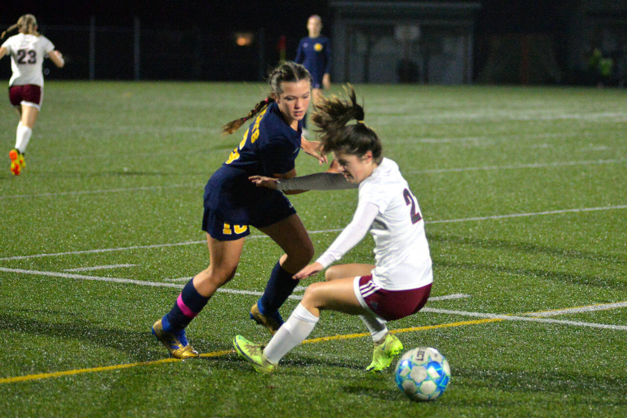 RYAN SPARKS | THE DAILY WORLD Aberdeen midfielder Abby Mainio (10) fouls WF West defender Audrey Toynbee during the Bobcats 3-1 loss on Tuesday at Stewart Field in Aberdeen.
